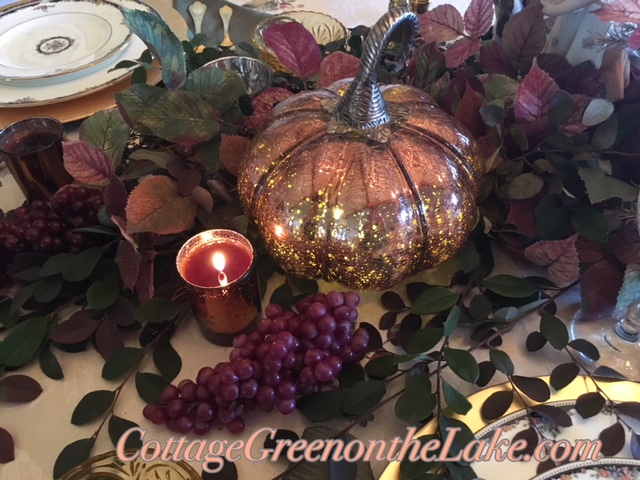 pumpkins, grapes, candlelight